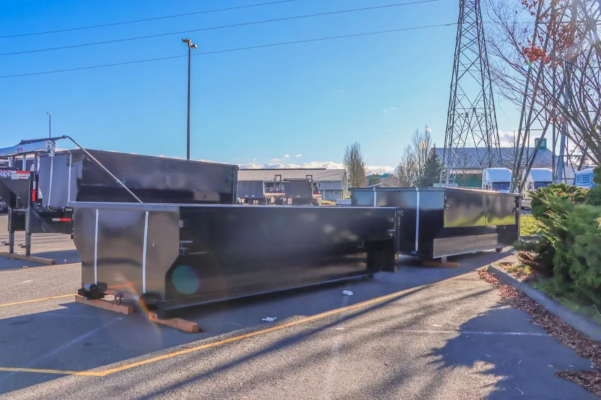 Roll-off dumpster ready for waste disposal at job site for 3 Yard Dumpster Rental in Rockledge